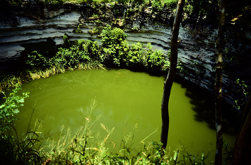 Sinkhole in an ancient city of the Maya empire used for sacrificial offerings