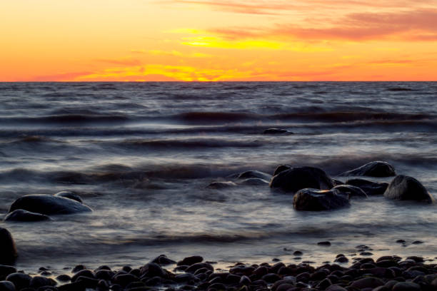 istock Colorful sunset on the beach 1294064086