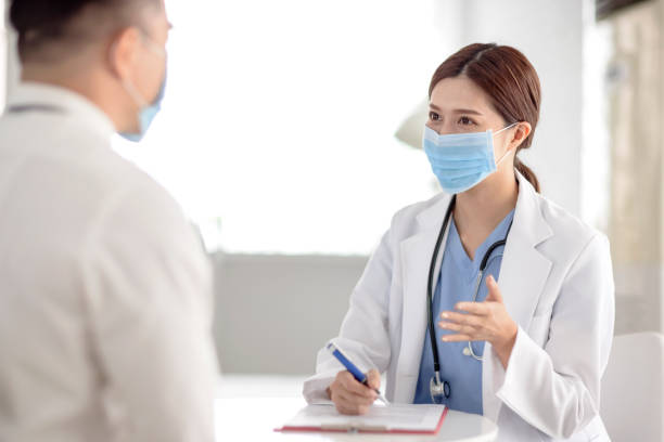istock doctor explaining diagnosis to her male patient 1294065842