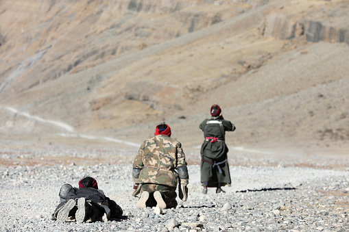 Pilgrim is on the way from their home town to the holy Mount Kailash, Tibet. There are thousands of pilgrims fulfill their faith by walking and kowtowing thousands of kilometer.