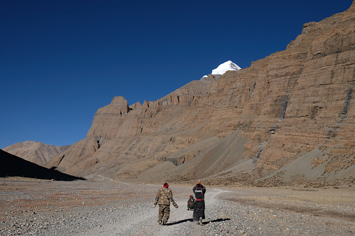 Pilgrim is on the way from their home town to the holy Mount Kailash, Tibet. There are thousands of pilgrims fulfill their faith by walking and kowtowing thousands of kilometer.