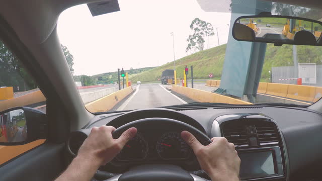 Driver's point of view in a toll. State of São Paulo, Brazil.