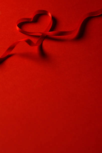istock Heart Shaped Red Ribbon 1294074430