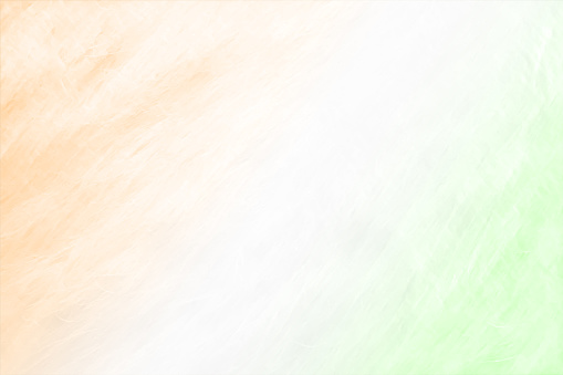 Tiranga - A horizontal vector illustration of three colors blending or merging into each other . A scratched textured wall effect. The first band is saffron or orange colored, the middle one white and the bottom most is green. Denotes the Indian National flag. Apt for Independence Day, 15 th August and Republic day 26 th January backdrops.