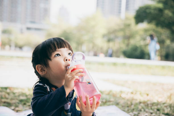 Little girl drinking water