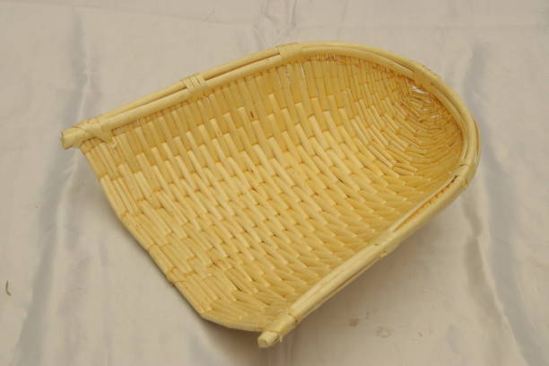 istock Handwoven wicker bamboo dustpan isolated. Basket art 1294110531