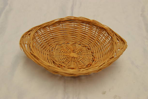 istock Brown empty handmade wicker basket with two handles. Food container. 1294110565