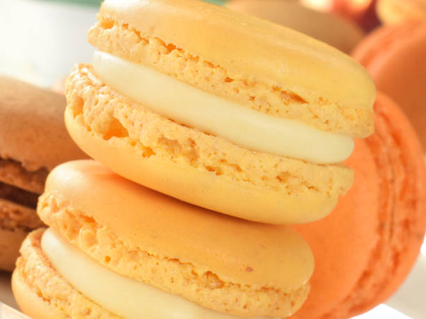 istock Yellow macaroons with citrus lemon filling closed up 1294114631