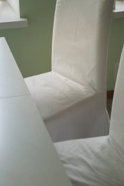 Chairs in white covers stock photo