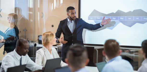 istock Financial Analyst Presenting A Graph To The Board Of Directors 1294118772