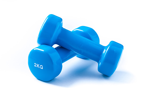 Front view of two blue dumbbells isolated on white background. Each dumbbell weight 2 kilograms. Studio shot taken with Canon EOS 6D Mark II and Canon EF 100 mm f/ 2.8
