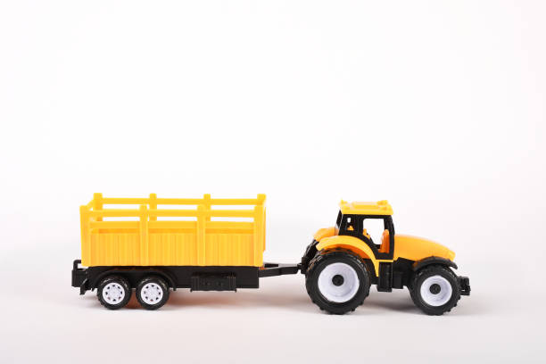 istock Toy tractor on the white background 1294124725