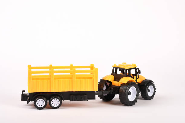 istock Toy tractor on the white background 1294124935