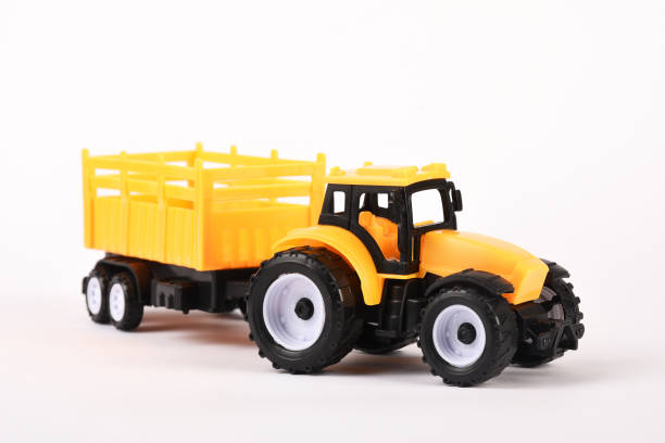 istock Toy tractor on the white background 1294125627