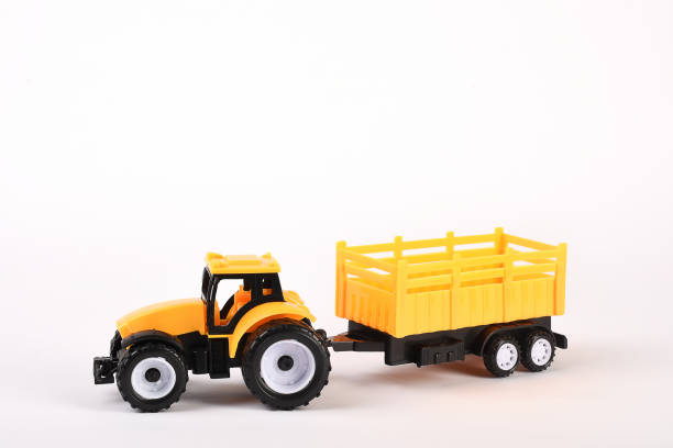 istock Toy tractor on the white background 1294126610