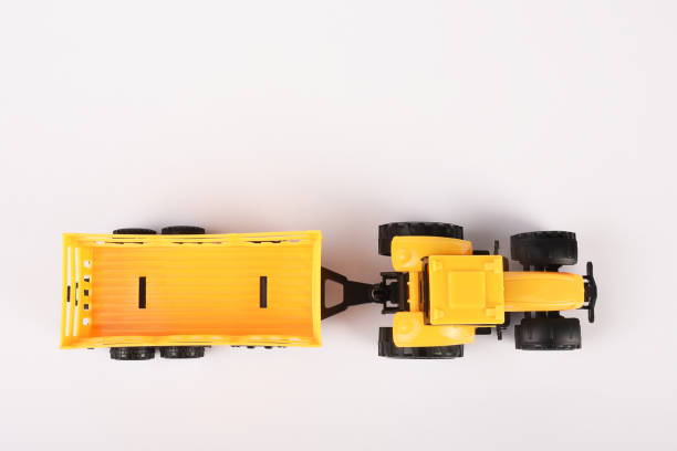 istock Toy tractor on the white background 1294126743