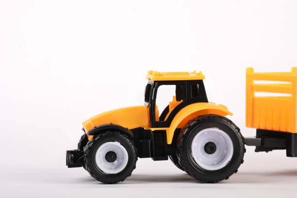 istock Toy tractor on the white background 1294126917