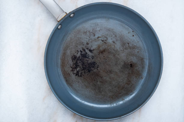 istock A ruined, non stick skillet on the kitchen counter 1294133765