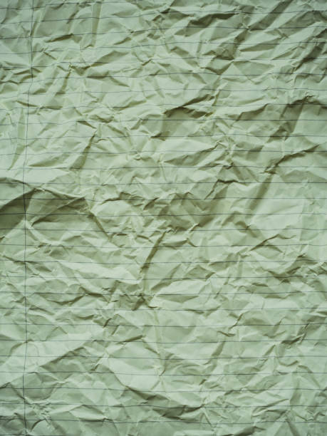 istock Top view abstract background with crumpled paper. Studies concept 1294134657