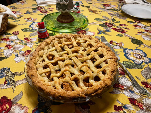 istock Apple pie with lattice on a floral tablecloth 1294139247