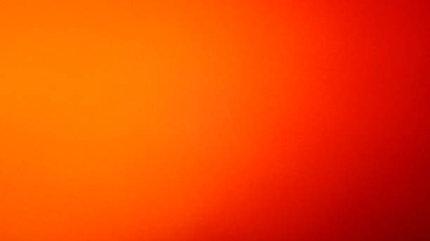 istock Beautiful vibrant orange red background with gradient. Banner background. 1294142437