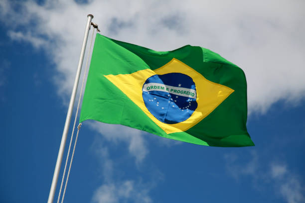 istock flag of brazil on flagpole 1294142642