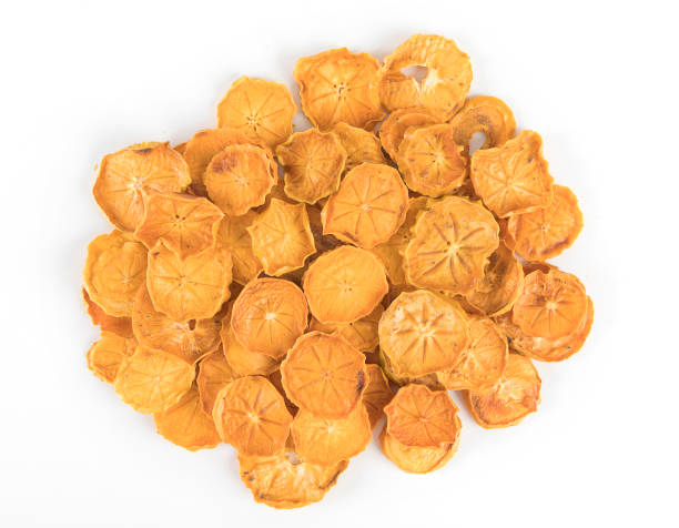 dried persimmon dried persimmon dried fruit on white stock pictures, royalty-free photos & images