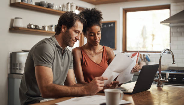 istock Our debt is almost paid off 1294144616