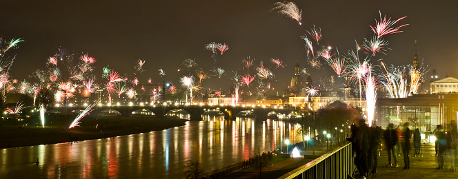 Panoramic view of the fireworks over the skyline of Dresden (Saxony, Germany) during the New Year celebrations