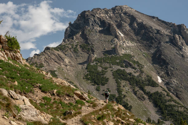 istock Hiker Cimbing Up Paintbrush Canyon Trail 1294149676