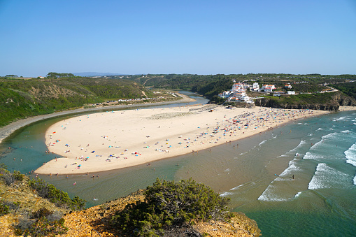 river inlet at odeceixe beach at west coast of algarve
