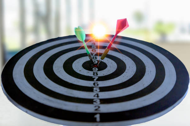 istock Target boards with arrows at sunset 1294153705