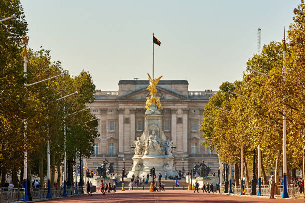 Buckingham Palace, London, UK London, UK, October 10, 2018: Close-up of Buckingham Palace and cityscape at sunset sunlight, London, England. buckingham palace photos stock pictures, royalty-free photos & images