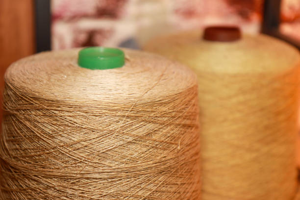 A close up of brown cotton spool