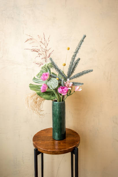 istock Composition of fresh flowers on beige background 1294160629