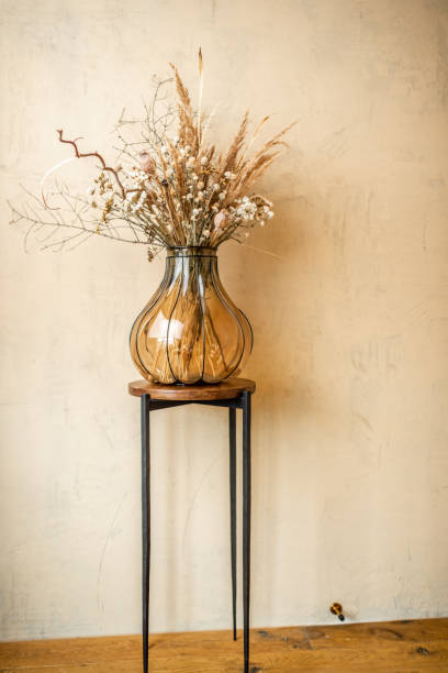 istock Composition of a dried herbs in a glass vase 1294160898