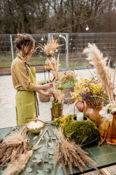 istock Woman making floral compositions 1294161251