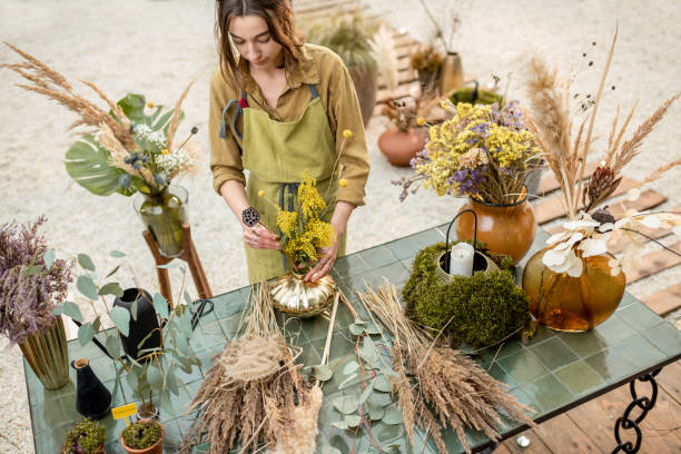 istock Woman making floral compositions 1294161329