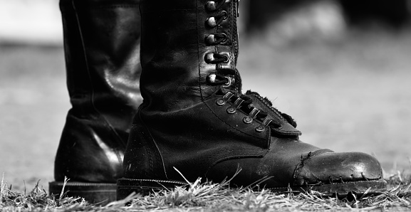 Old leather boots unique black and white photo