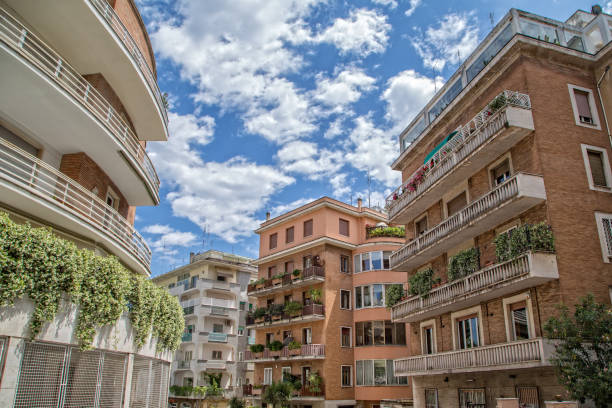 House building exterior facade with windows and balconies in Parioli district, Rome, Italy