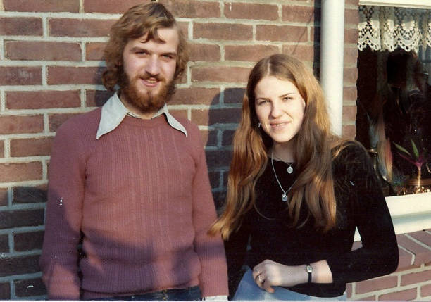 Retro seventies couple Young couple in the seventies instant print black and white stock pictures, royalty-free photos & images