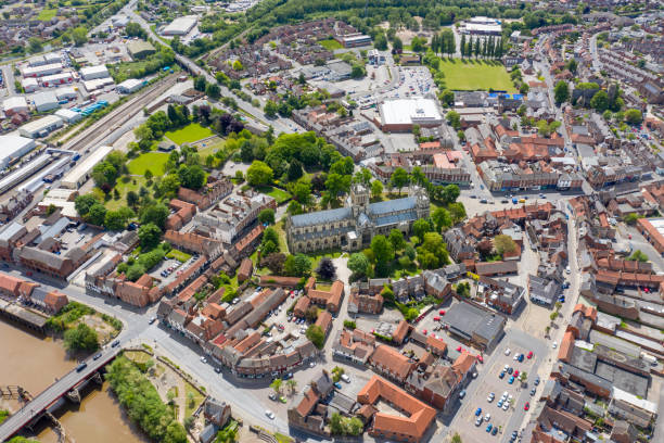 Aerial photo of the historical Selby Abbey in the town of Selby in York North Yorkshire in the UK showing the English medieval church buildings displaying both Norman and Gothic styles in the town stock photo