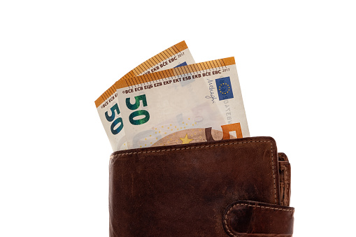 Brown leather wallet with Euro currency  banknotes - white background