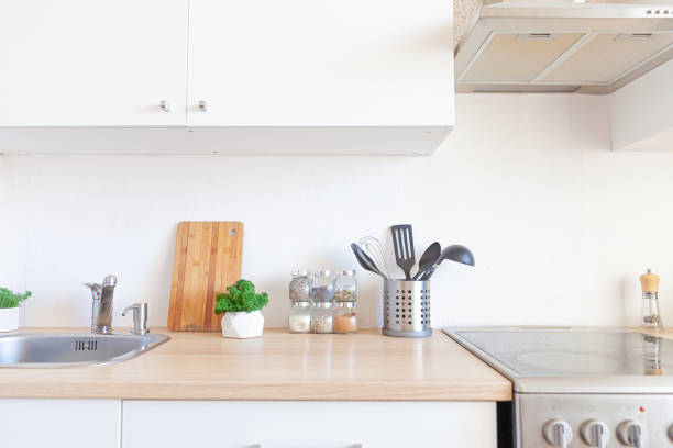 istock Scandinavian classic minimalistic kitchen with white and wooden details. Modern white kitchen clean contemporary style interior design 1294177446