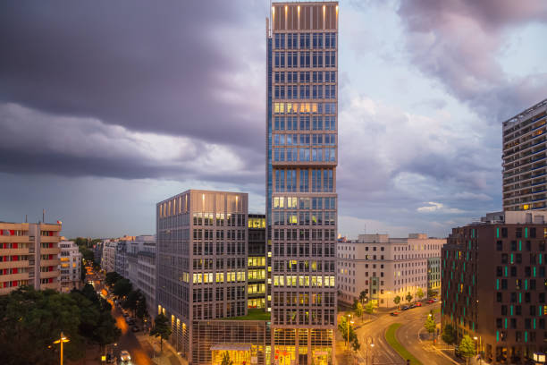 здание сбербанка восточного берлина - berlin germany overcast dramatic sky skyline стоковые фото и изображения