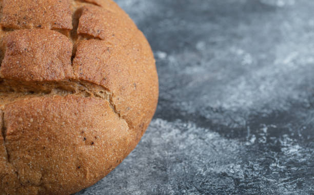 istock Close up photo half of rye bread 1294185978