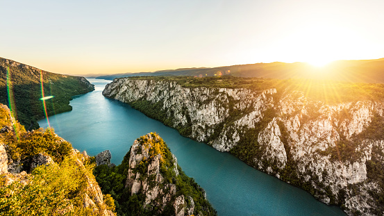 Danube river flowing through the amazing Djerdap gorge in Serbia. Beautiful coastline of second biggest river in Europe. One of very popular National parks and famous travel destination. Photo taken from the best view point. High resolution, beautiful for small and big prints and backgrounds.