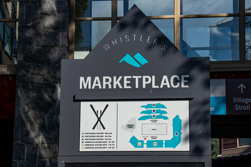 Whistler, Canada - July 5,2020: View of sign Whistlers's Marketplace in the village