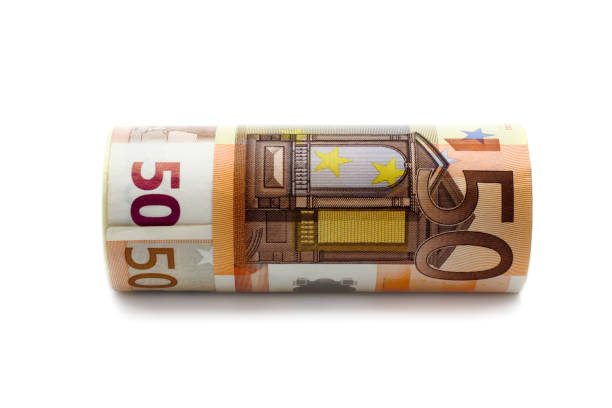 istock money worth 50 euros rolled on the white background 1294189082