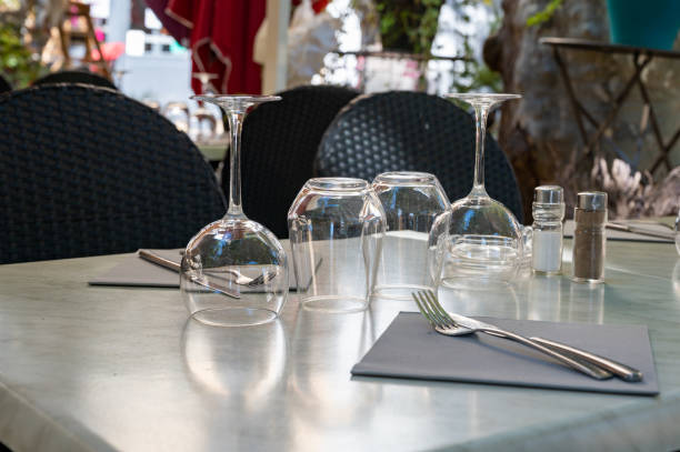 istock Before lunch time, empty stylish cafes with served tables waiting for guests in Saint-Tropez, Provence, France 1294191209